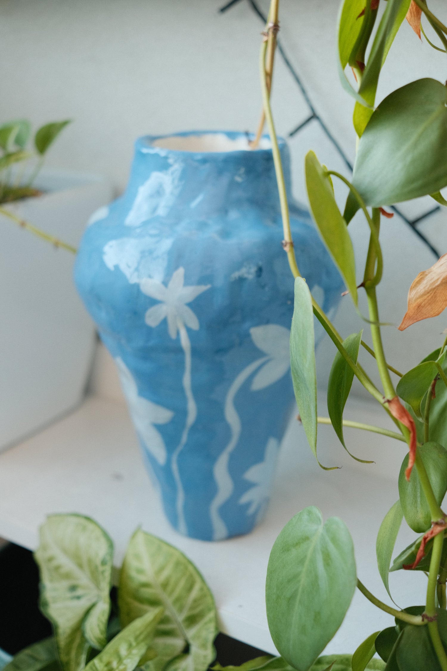 Blue and white handbuilt pottery vase